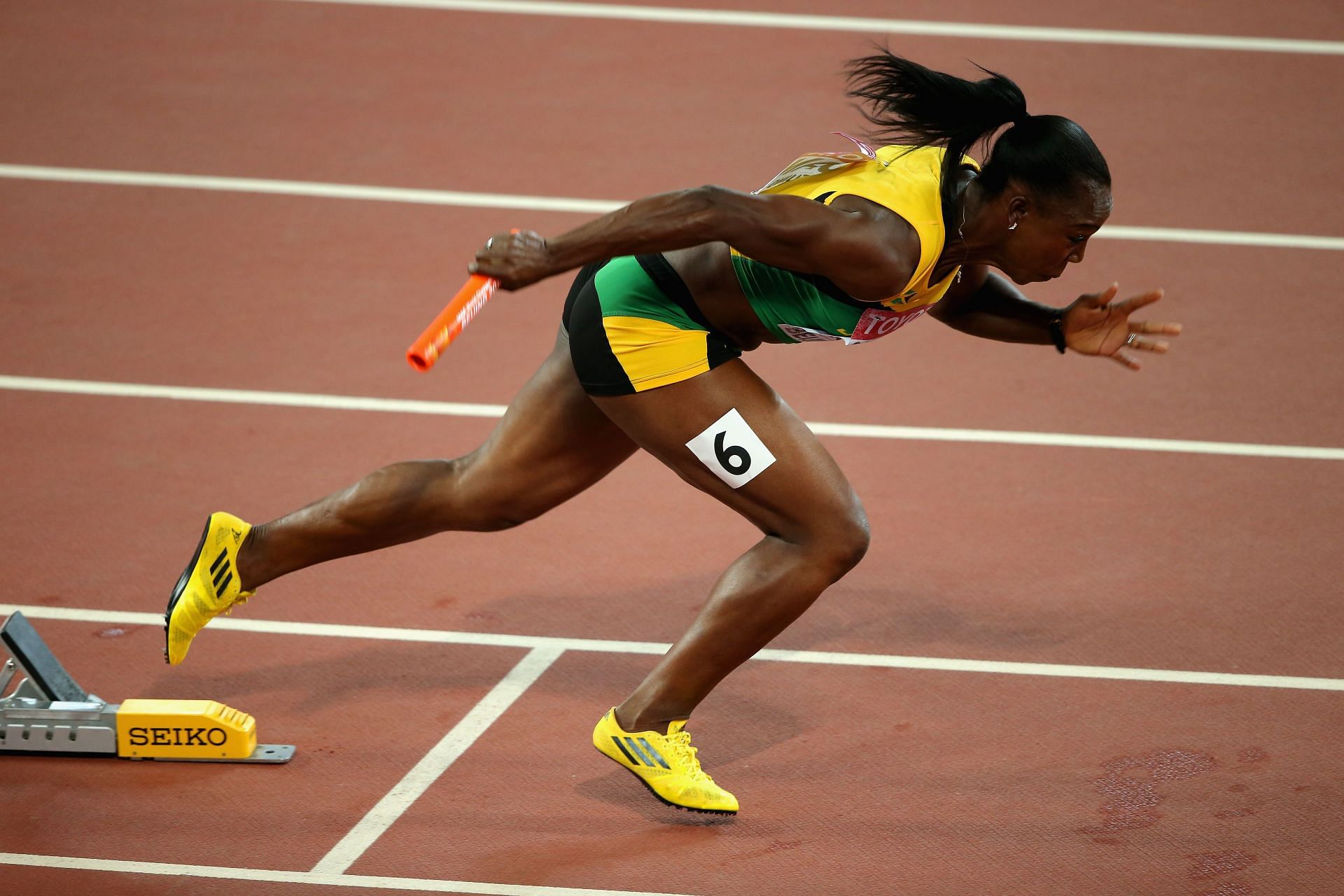 Veronica Campbell-Brown of Jamaica starts in the Women's 4x100 Metres Relay final during the 15th IAAF World Athletics Championships Beijing National Stadium Beijing, China.